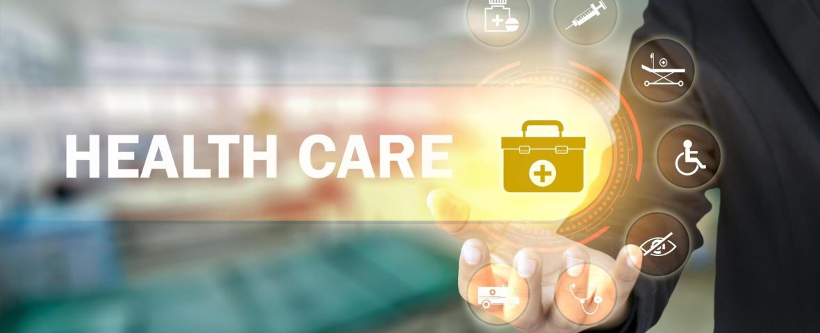 businessman-holding-icons-with-medical-symbols-on-blurry-background-health-insurance-concept-health-care-and-health-insurance-business-free-photo